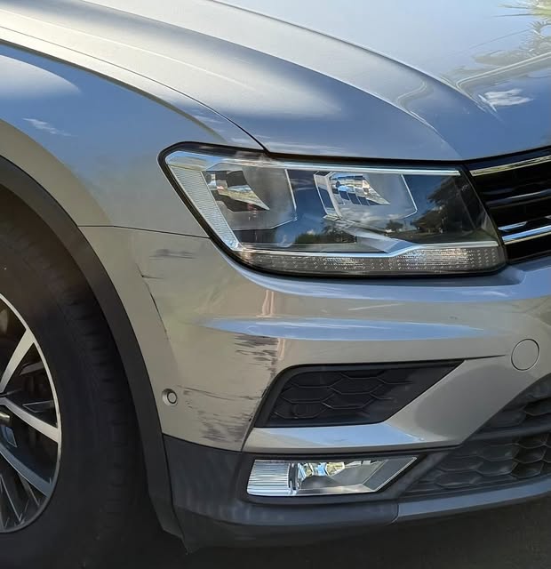 Damaged bumper on car